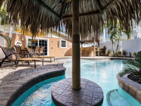 Tiki Cottage steps from the beach