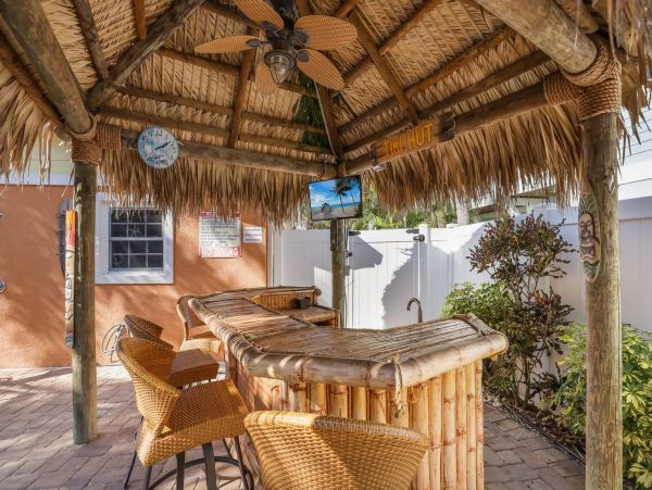 Tiki Cottage steps from the beach