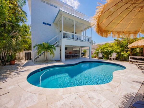 Pet Friendly Anna Maria Vacation Pool Home Sleeps 8 Guests, two blocks from the beach!