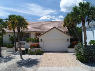 Two Bedroom Vacation Home on Sanibel Island with Caged Pool