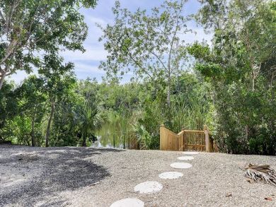 Two Bedroom Vacation Home on Sanibel Island with Caged Pool
