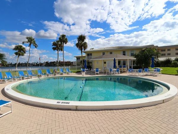 Beach Across the Street Vacation Condo with Pool & Boat Dock