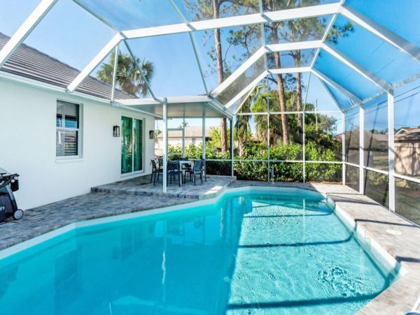 Three Bedroom Home in Naples with Caged Pool & Hot Tub - Your Coastal Escape Awaits