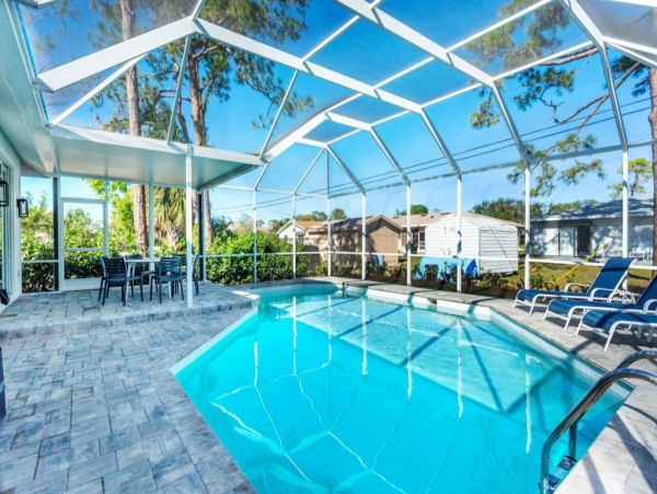 Three Bedroom Home in Naples with Caged Pool & Hot Tub - Your Coastal Escape Awaits