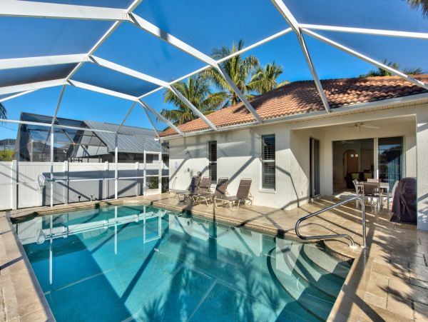 Walk to Vanderbilt Beach Three Bedrooms Plus Den Villa