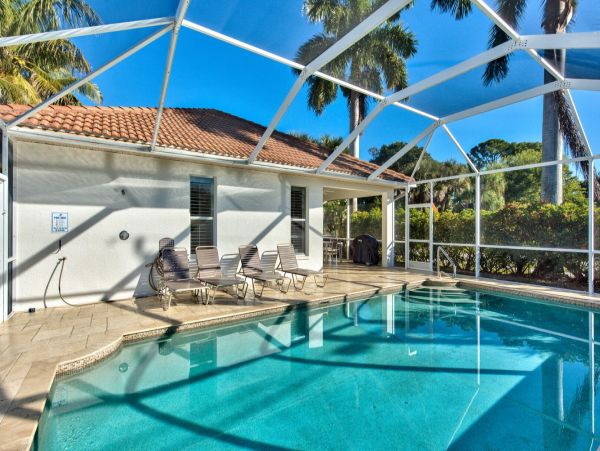 Walk to Vanderbilt Beach Three Bedrooms Plus Den Villa
