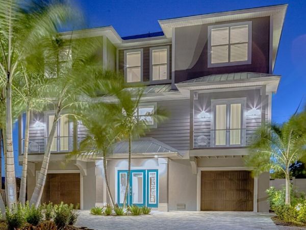 Fort Myers Beach Luxury Vacation Rental Florida Gulf Coast Canal front Home with Pool & Dock