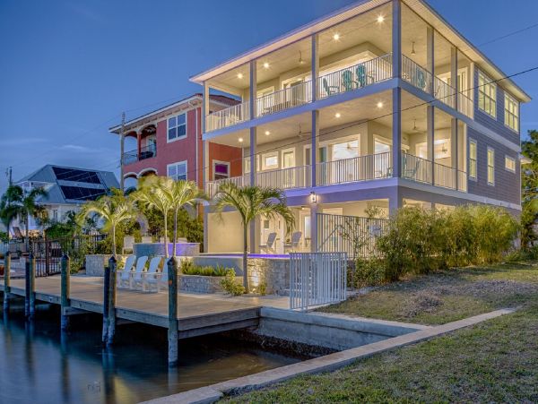 Fort Myers Beach Luxury Vacation Rental Florida Gulf Coast Canal front Home with Pool & Dock