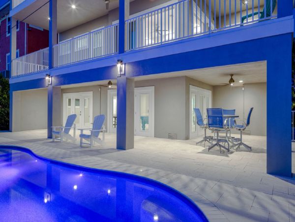 Fort Myers Beach Luxury Vacation Rental Florida Gulf Coast Canal front Home with Pool & Dock