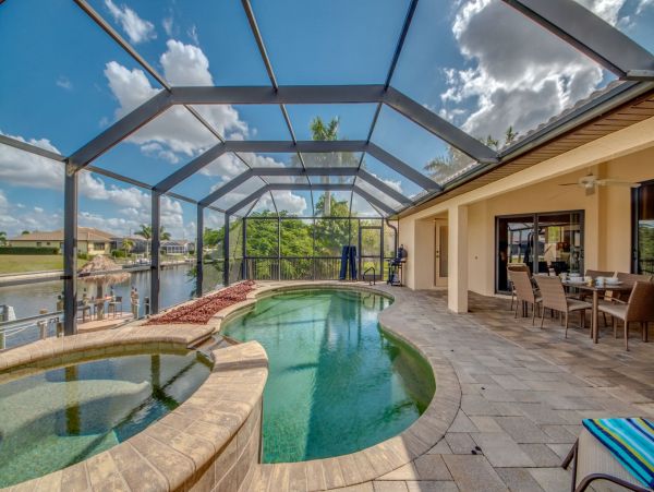 Cape Coral Vacation Home Five Bedrooms & Private Caged Pool