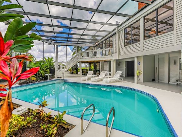 Sanibel Island Vacation Rental | Luxury Beachfront Pool Home with Private Beach