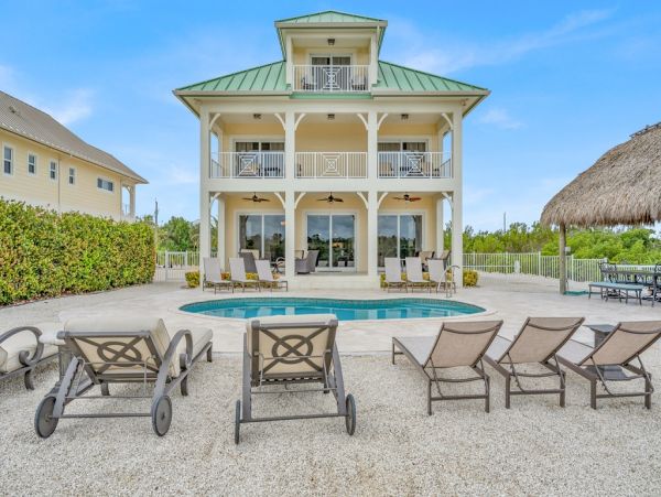 Canal Front 6 Bedroom Home in Marathon, Walk to Beach