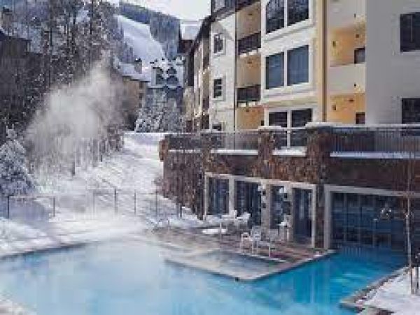 Top Floor Ski in Ski out residence in Village