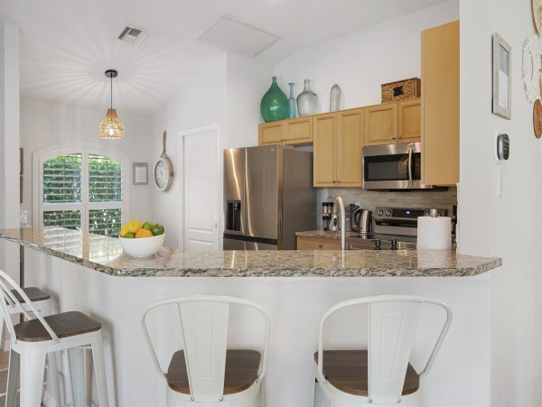 Naples Florida Vacation Rental | Luxury Waterfront Pool Villa with Lake View