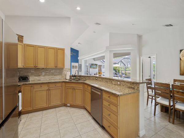 Naples Florida Vacation Rental | Luxury Waterfront Pool Villa with Lake View