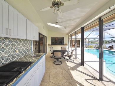 Naples Canal Front Three Bedroom Vacation Home Walk to Beach