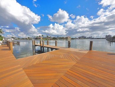 Naples Canal Front Three Bedroom Vacation Home Walk to Beach