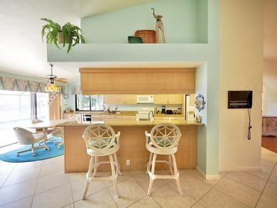 Naples Canal Front Three Bedroom Vacation Home Walk to Beach