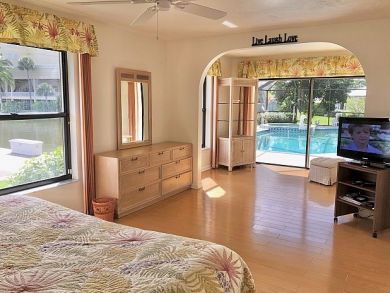 Naples Canal Front Three Bedroom Vacation Home Walk to Beach