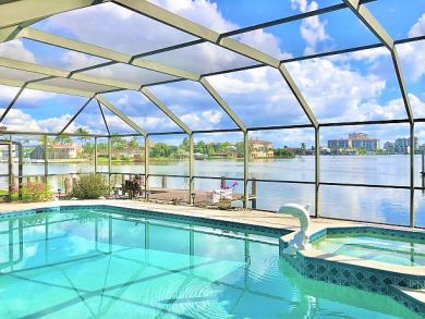 Naples Canal Front Three Bedroom Vacation Home Walk to Beach