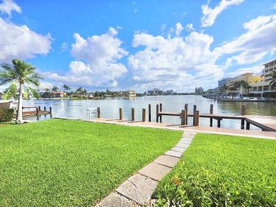 Naples Canal Front Three Bedroom Vacation Home Walk to Beach