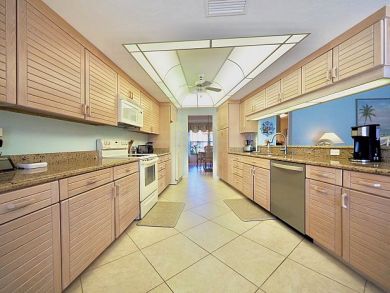 Naples Canal Front Three Bedroom Vacation Home Walk to Beach
