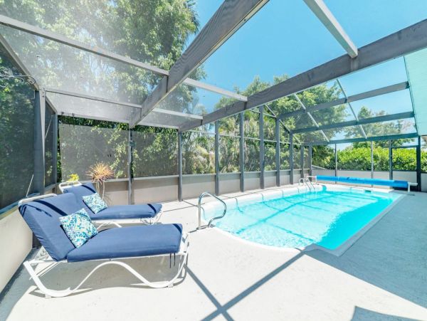 Marco Island Vacation Home Caged Pool & Short Walk to Beach