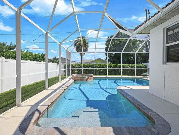 Naples Vacation Rental - Vanderbilt Beach Coastal Retreat with Heated Pool & Outdoor Kitchen