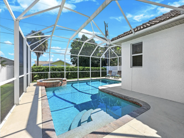 Naples Vacation Rental - Vanderbilt Beach Coastal Retreat with Heated Pool & Outdoor Kitchen