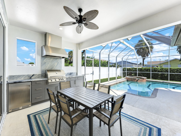 Naples Vacation Rental - Vanderbilt Beach Coastal Retreat with Heated Pool & Outdoor Kitchen