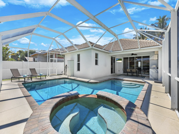 Naples Vacation Rental - Vanderbilt Beach Coastal Retreat with Heated Pool & Outdoor Kitchen