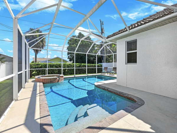 Naples Vacation Rental - Vanderbilt Beach Coastal Retreat with Heated Pool & Outdoor Kitchen