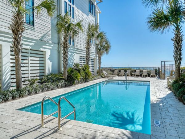The Only Thing Separating You From the Beach is the Pool!