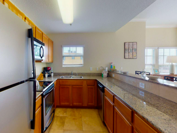 Two Bedroom Condo with shared pool & beach views