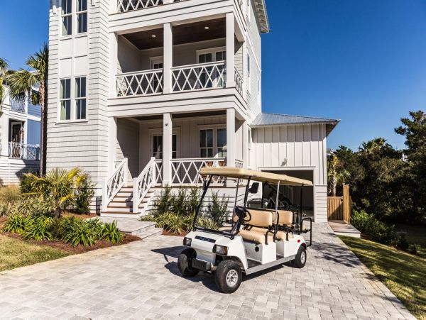 Charming Coastal Home with Five Bedrooms & Partial Ocean Views