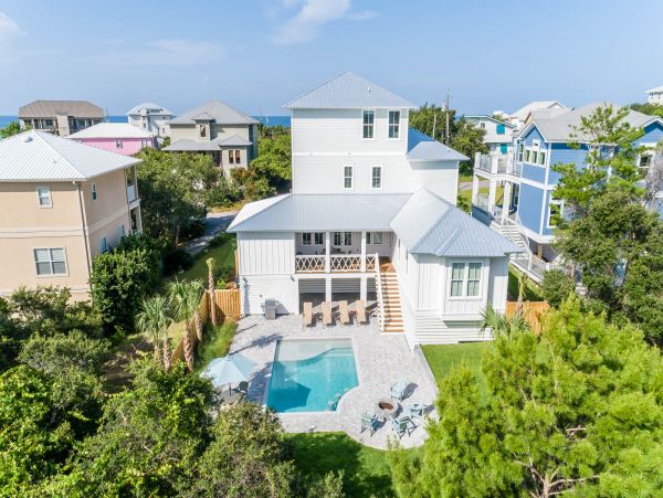 Charming Coastal Home with Five Bedrooms & Partial Ocean Views