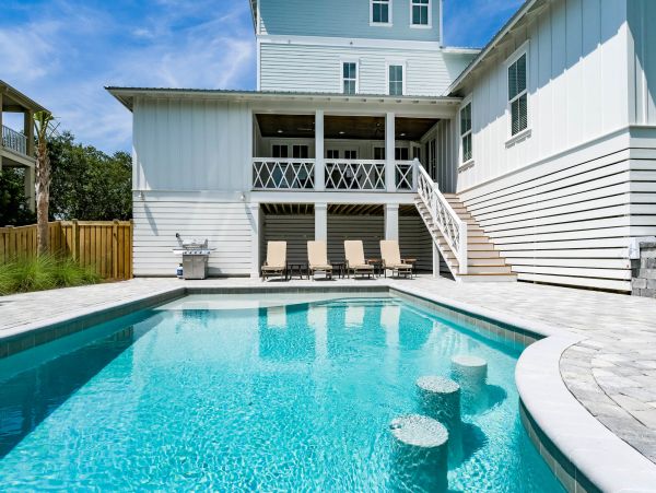 Charming Coastal Home with Five Bedrooms & Partial Ocean Views