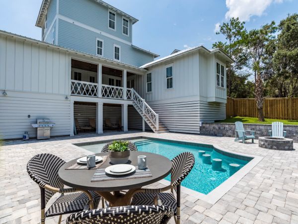 Charming Coastal Home with Five Bedrooms & Partial Ocean Views