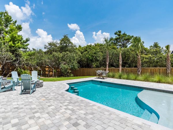 Charming Coastal Home with Five Bedrooms & Partial Ocean Views