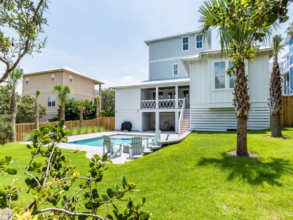 Charming Coastal Home with Five Bedrooms & Partial Ocean Views