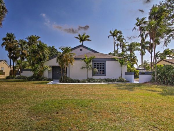 Two Bedroom Vacation Home with Private Caged Pool Sleeps 8
