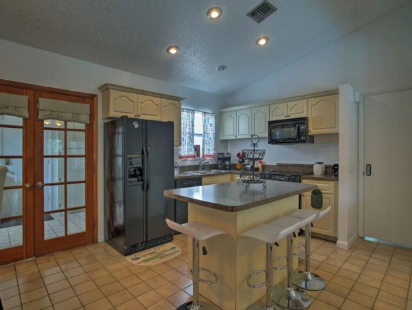 Two Bedroom Vacation Home with Private Caged Pool Sleeps 8
