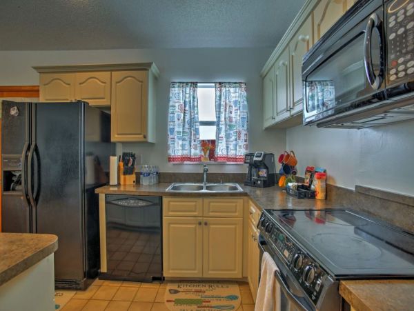 Two Bedroom Vacation Home with Private Caged Pool Sleeps 8