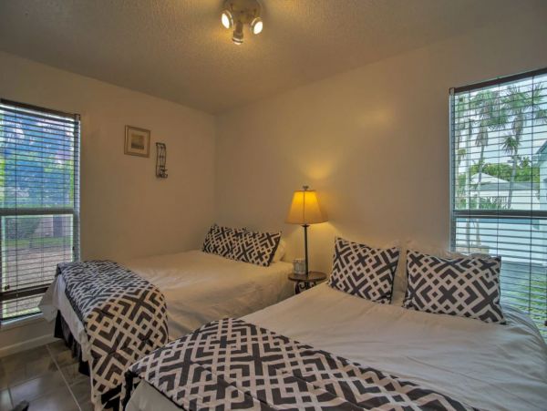 Two Bedroom Vacation Home with Private Caged Pool Sleeps 8
