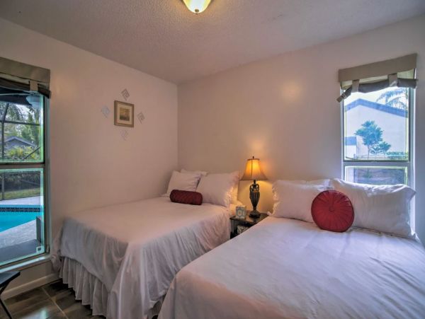 Two Bedroom Vacation Home with Private Caged Pool Sleeps 8