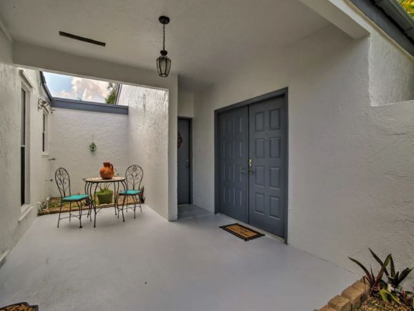 Two Bedroom Vacation Home with Private Caged Pool Sleeps 8
