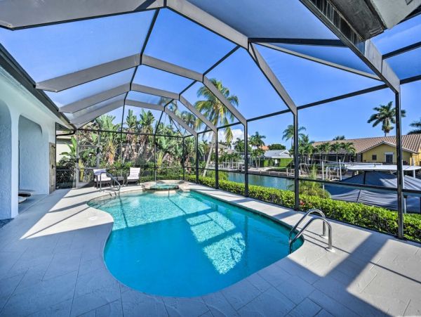 Marco Island Canal Front Home Pool Spa Dock & Walk to Beach