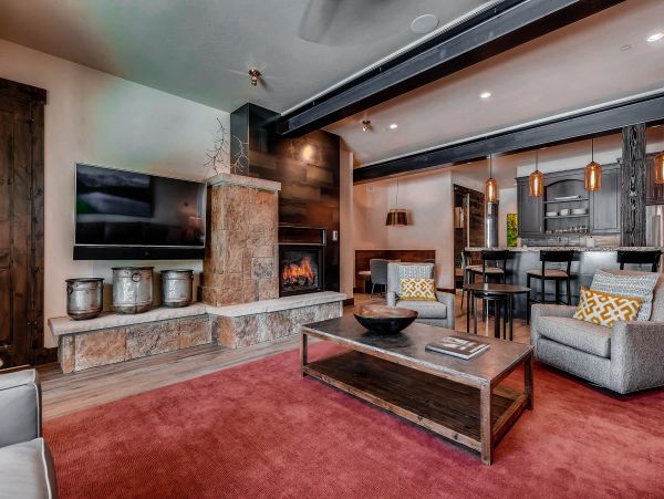  Mid level den features TV and fireplace