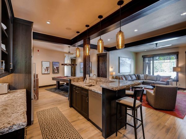  Mid level lounge area with wet bar and billiards