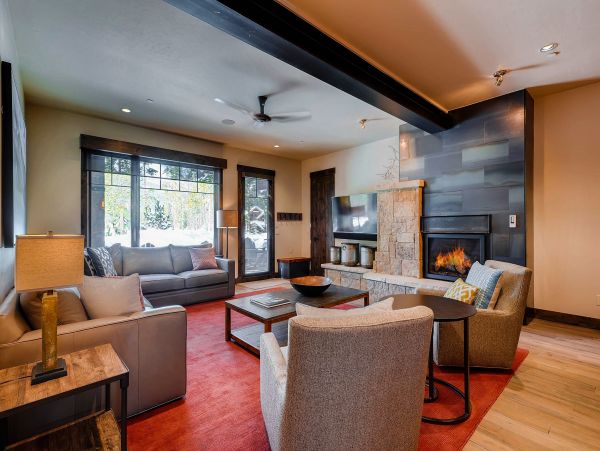  Mid level relaxation area with a warm fire for cold days and quick access to the wet bar area with full size refrigerator